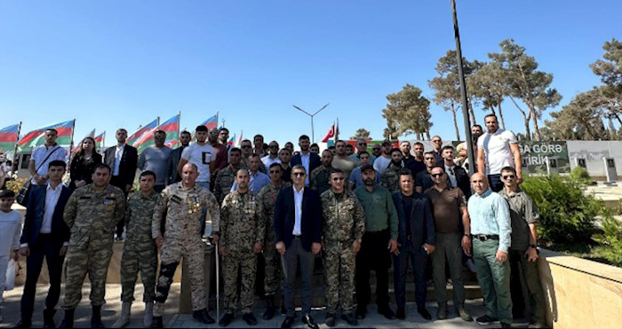 "Xususi teyinatlilarin qazileri, sehid aileleri ve veteranlari" IB-nin uzvleri sehidleri yad edib