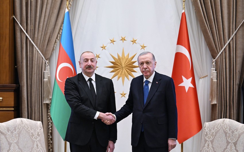Ilham Eliyev Erdogana bassagligi verib