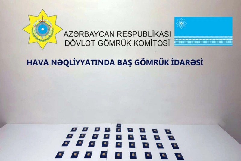 Gomruk nezaretinden gizledilmis qizil kulceler askarlanib